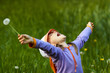 happy girl with dandelion