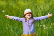 joyful girl with dandelion