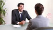 Business people sitting at a desk