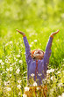 girl in a field with dandelions