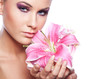 portrait of a beautiful delicate woman with flower