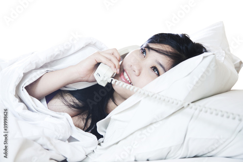 Photo: Sexy young woman talking on the phone Sexy young woman talking on the phone