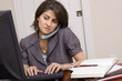 Photo: Businesswoman in home office Businesswoman in home office