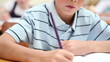 Video: Little boy writing on his notebook Little boy writing on his notebook