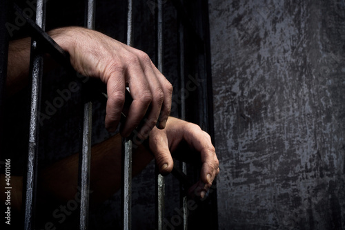 Photo: Hands of the prisoner Hands of the prisoner
