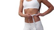 Woman using a tape to measure her waist