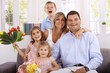Photo: Happy family smiling at home Happy family smiling at home