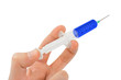 Syringe in hand Syringe in hand