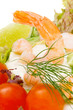 Healthy salad of shrimp, mixed greens and tomatoes.