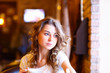 Young pretty woman sitting in restaurant Young pretty woman sitting in restaurant