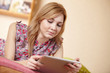 woman holding a touchpad pc