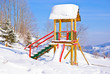 Playground covered with snow in Polish mountains, Zawoja, Poland