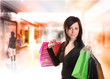 Shopping young woman in the shopping mall.