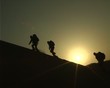 Backpackers on the slope