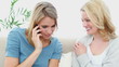 Woman on the phone laughing with a friend