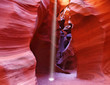 A thin ray of sunlight illuminates the canyon A thin ray of sunlight illuminates the canyon