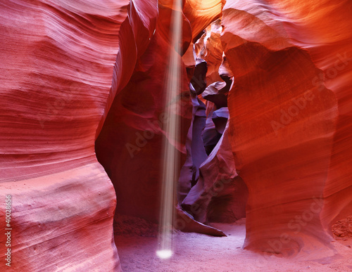Photo: A thin ray of sunlight illuminates the canyon A thin ray of sunlight illuminates the canyon