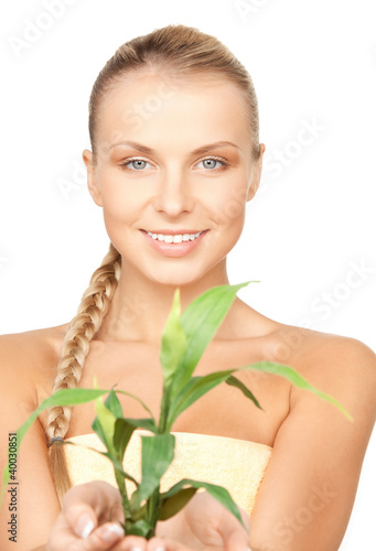 Foto: woman with green sprout woman with green sprout
