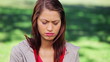 Video: Upset brunette woman standing upright Upset brunette woman standing upright