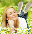 Beautiful female enjoying flower filed