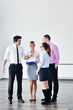 Group of young business people at meeting
