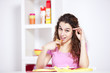 .Young woman eating toast