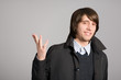 man with his hand raised