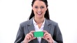 Smiling brunette woman holding a business card