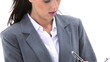 Businesswoman writing on a notepad 