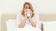 Happy woman drinking a coffee