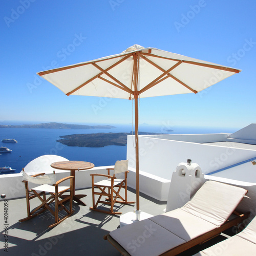 Foto: Santorin - Terrasse et parasol Santorin - Terrasse et parasol