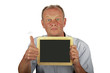 Man with empty black board and putting tumbs up