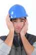 A depressed construction worker.