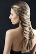 long hair and fashion hairstyle, she looks at left