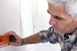 Man with a spirit level