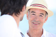 Smiling men in the sunshine