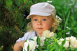 Cute boy playing in the garden