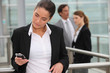 Woman reading message on mobile