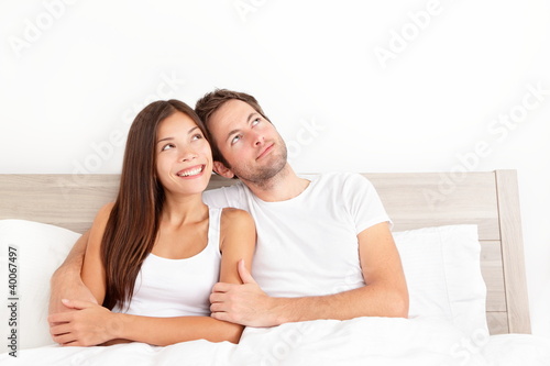 Photo: Happy couple in bed Happy couple in bed