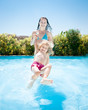 Happy child playing with mother