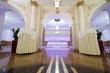 Beautiful light hall with white columns in Hotel