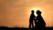 Mother loving son silhouette
