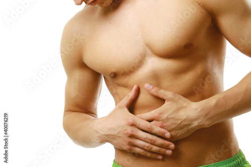 Foto: An abdominal pain isolated on white background An abdominal pain isolated on white background