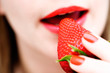 Eating a strawberry