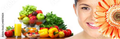 Photo: Beautiful woman with flower and vegetables. Beautiful woman with flower and vegetables.