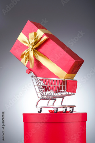 Photo: Christmas shopping concept with shopping cart Christmas shopping concept with shopping cart