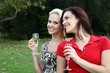 Lovely Women Drinking Wine Outdoors Lovely Women Drinking Wine Outdoors