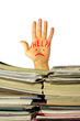 Hand over a pile of documents