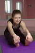 Female fitness yoga in the gym