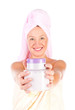 Beautiful woman tender jar of moisturizer cream.